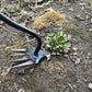 Handgereedschap voor het verwijderen van onkruid in de tuin