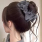 Pruik & strik Stijlvolle haaraccessoire